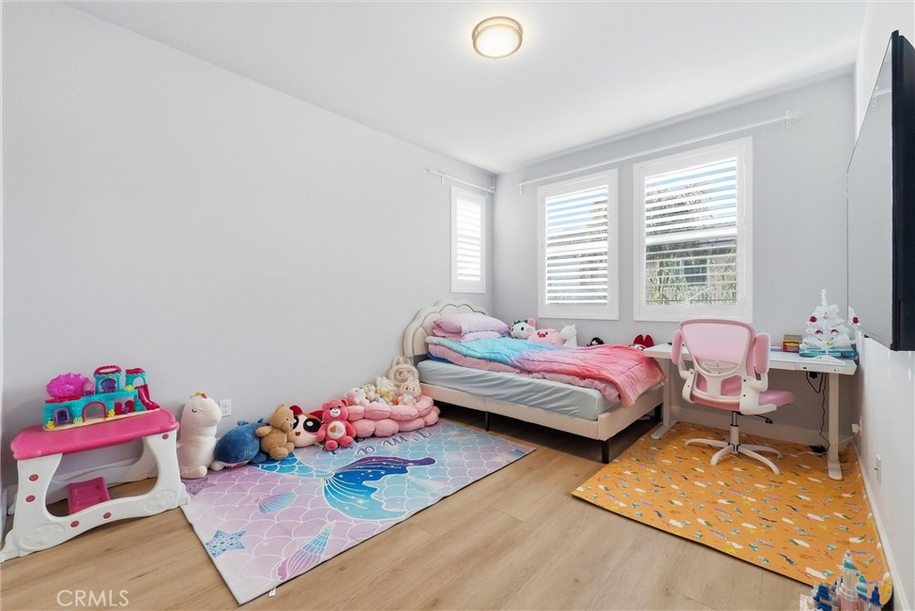 15828 Kingston Road Chino Hills, CA 91709 - Photo 24 of 28 a bedroom with furniture and a window