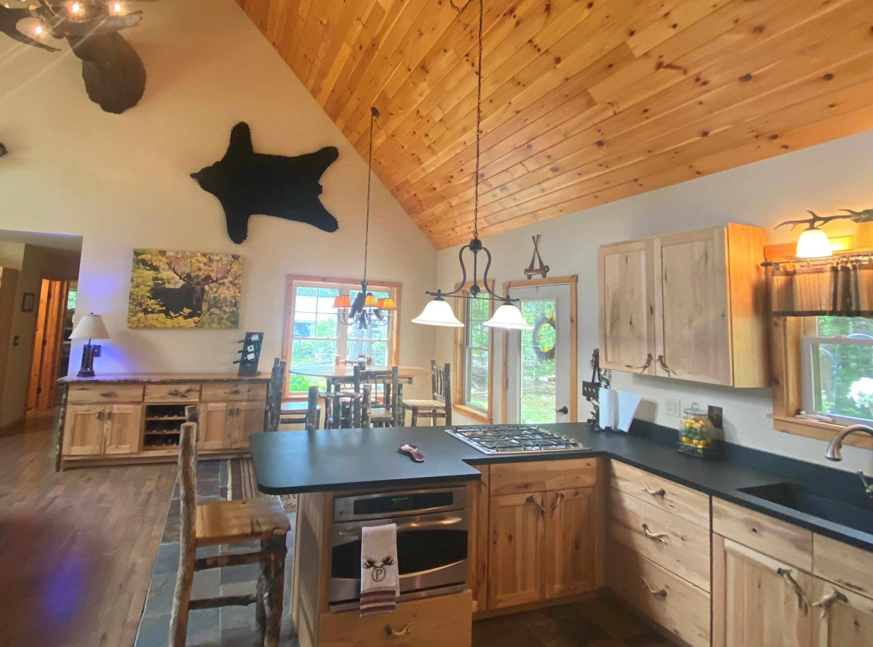 566 Springy Pond Road Otis, ME 04605 - Photo 10 of 36 Kitchen and Dining