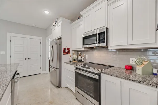 a room with furniture and air hockey table