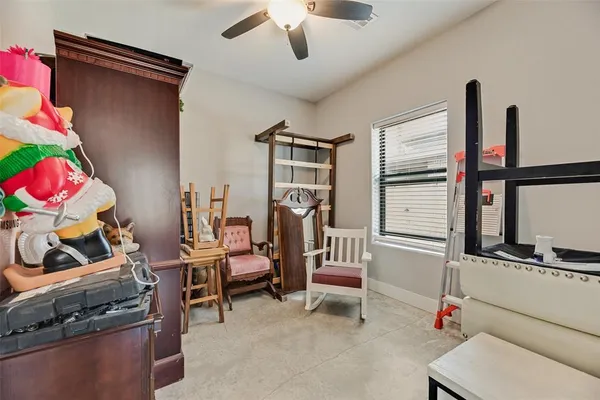 a room with furniture a washer and dryer