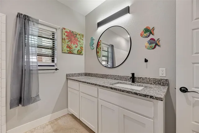 a bathroom with a toilet and a sink