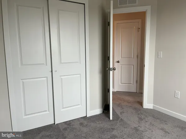 a view of a workspace with furniture