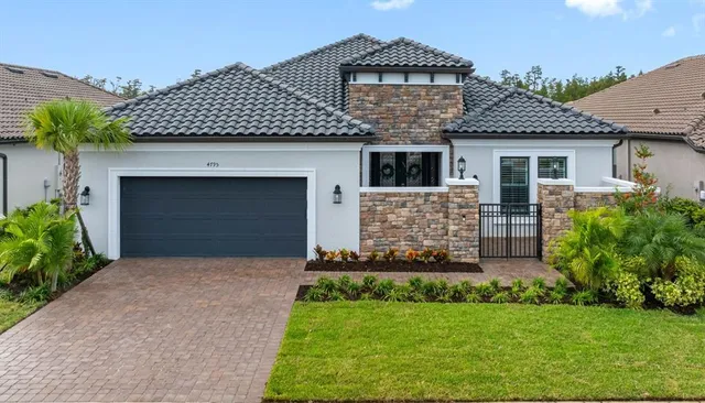 $875,000 | 4795 Freccia Loop, Wesley Chapel, FL 33543