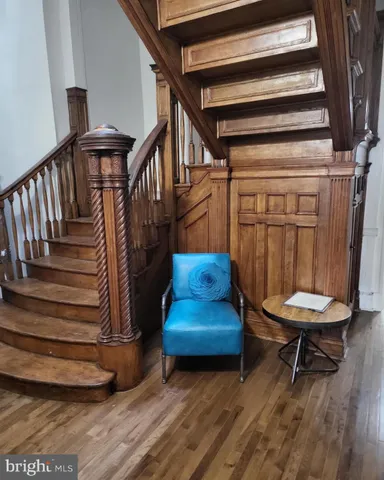 a view of entryway with wooden floor