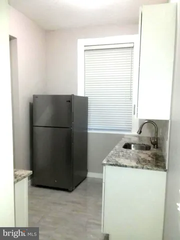 a view of a house with a park