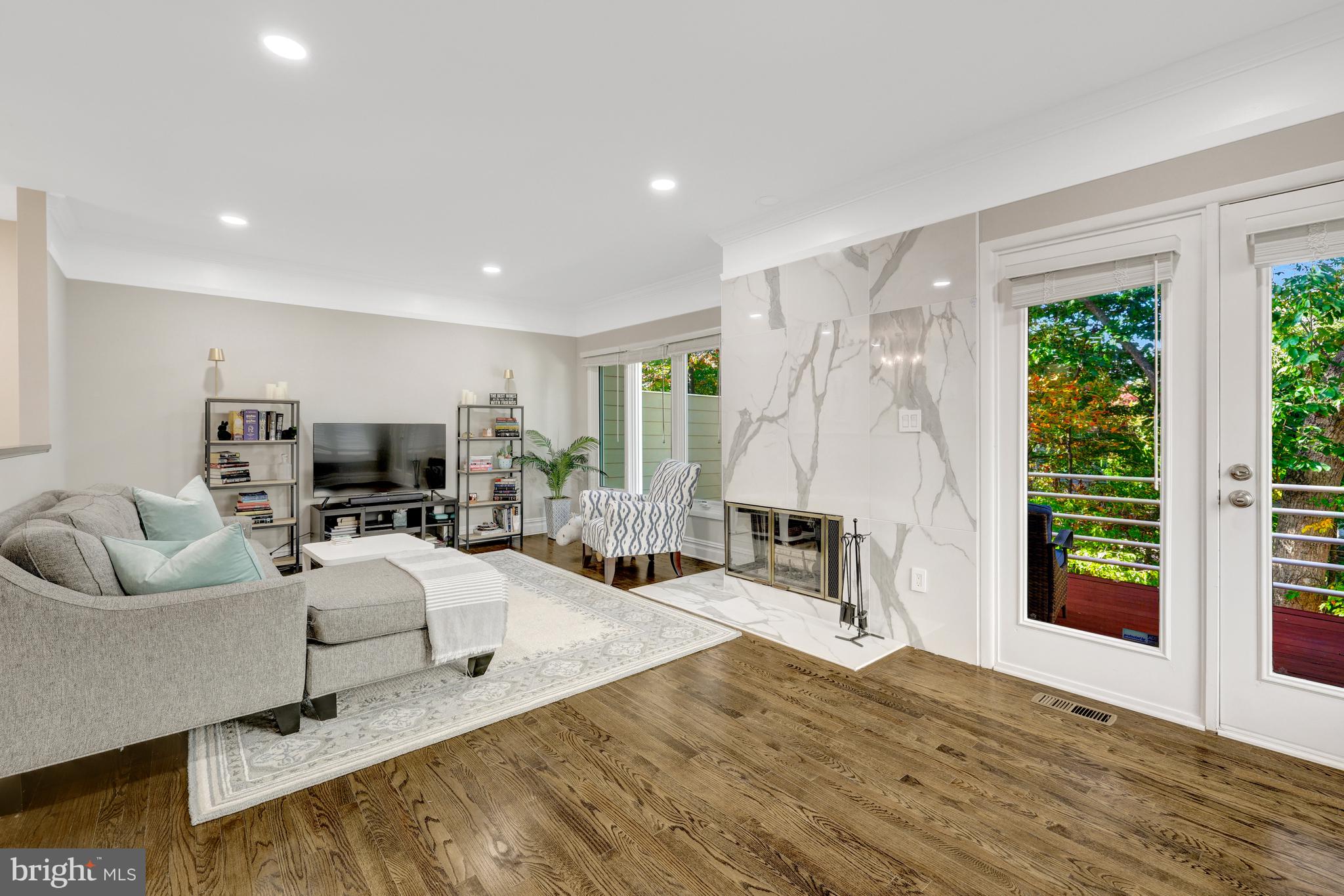 11110 Lakespray Way Reston, VA 20191 - Photo 15 of 60 Glass doors open to the main level deck.