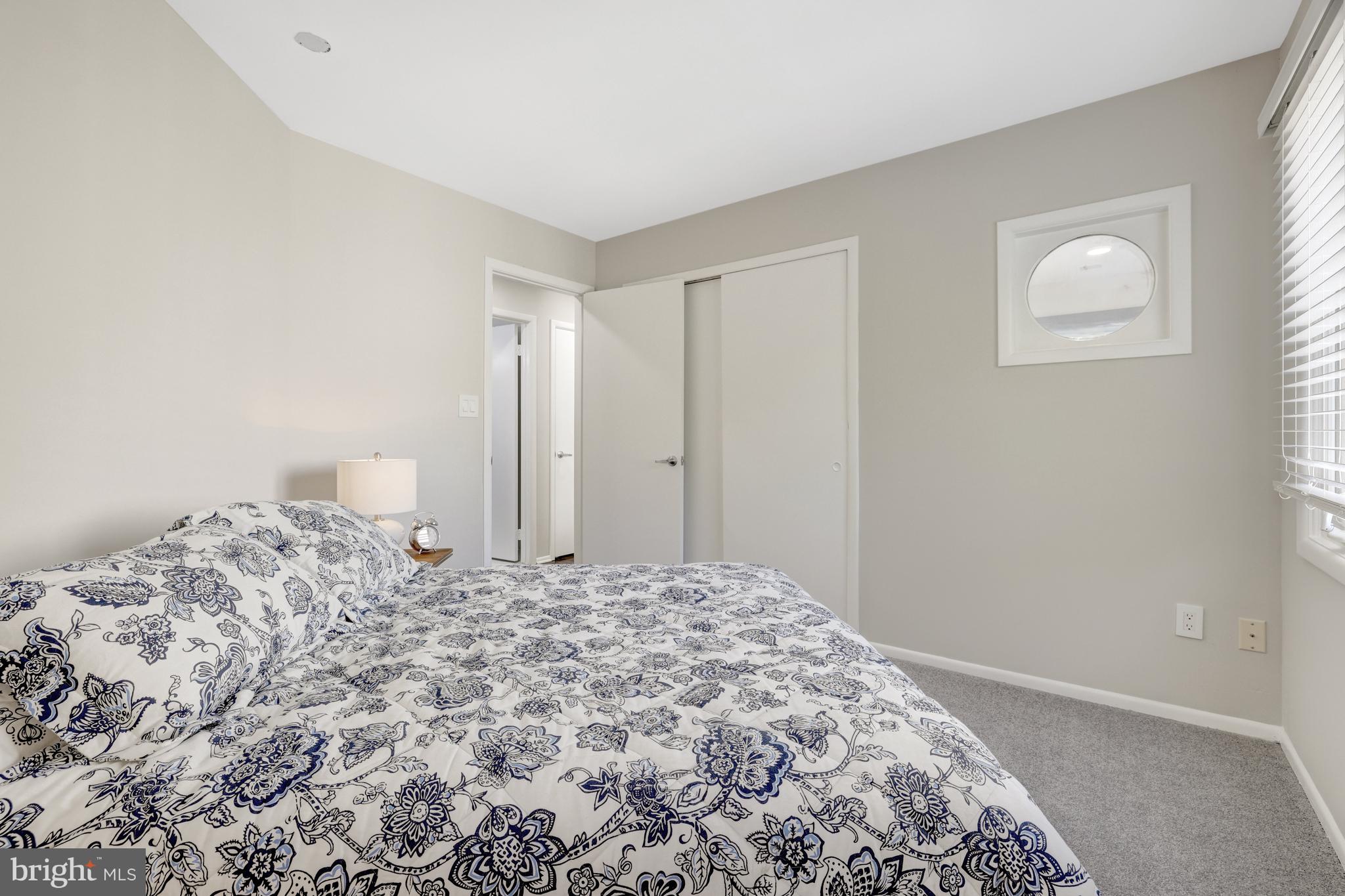 11110 Lakespray Way Reston, VA 20191 - Photo 38 of 60 Bedroom #3 w/sliding door closet & accent window.