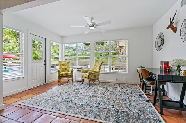 a living room with furniture and a table