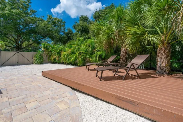 a view of a backyard of a house