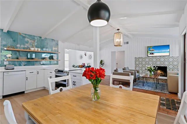 a living room with granite countertop furniture and a fireplace