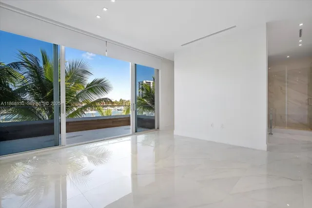 a view of a room with a large window