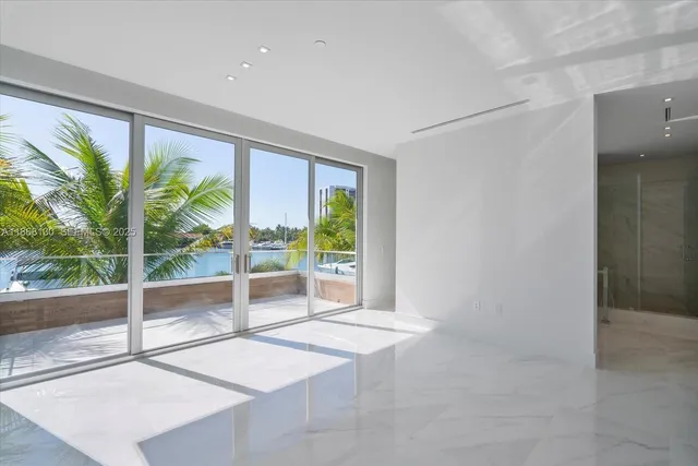 a view of swimming pool with outdoor seating and plants