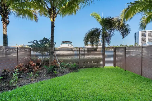 a garden view with palm trees