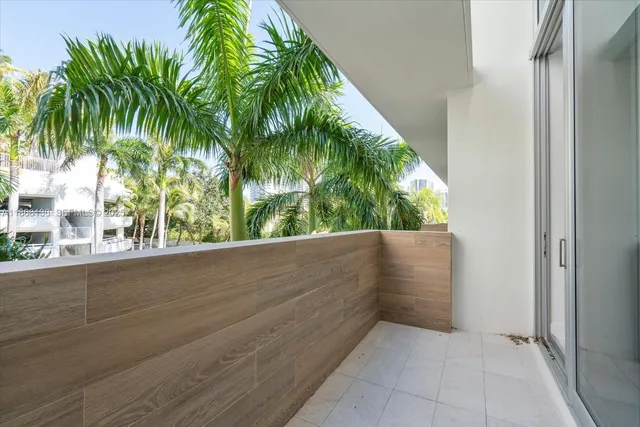 a bathroom with a shower and a sink