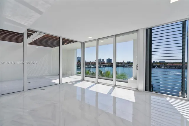 a view of a swimming pool with sitting area