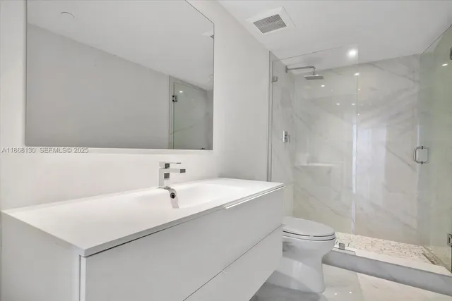 a view of a city with tall buildings