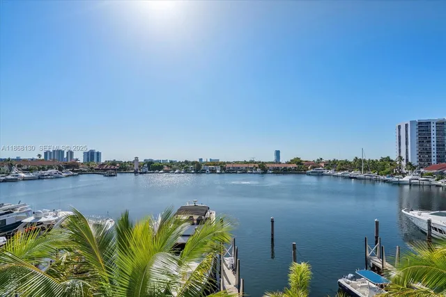 a view of an empty room with a cabinet