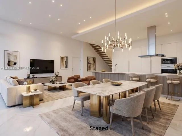 a kitchen with a sink and a refrigerator