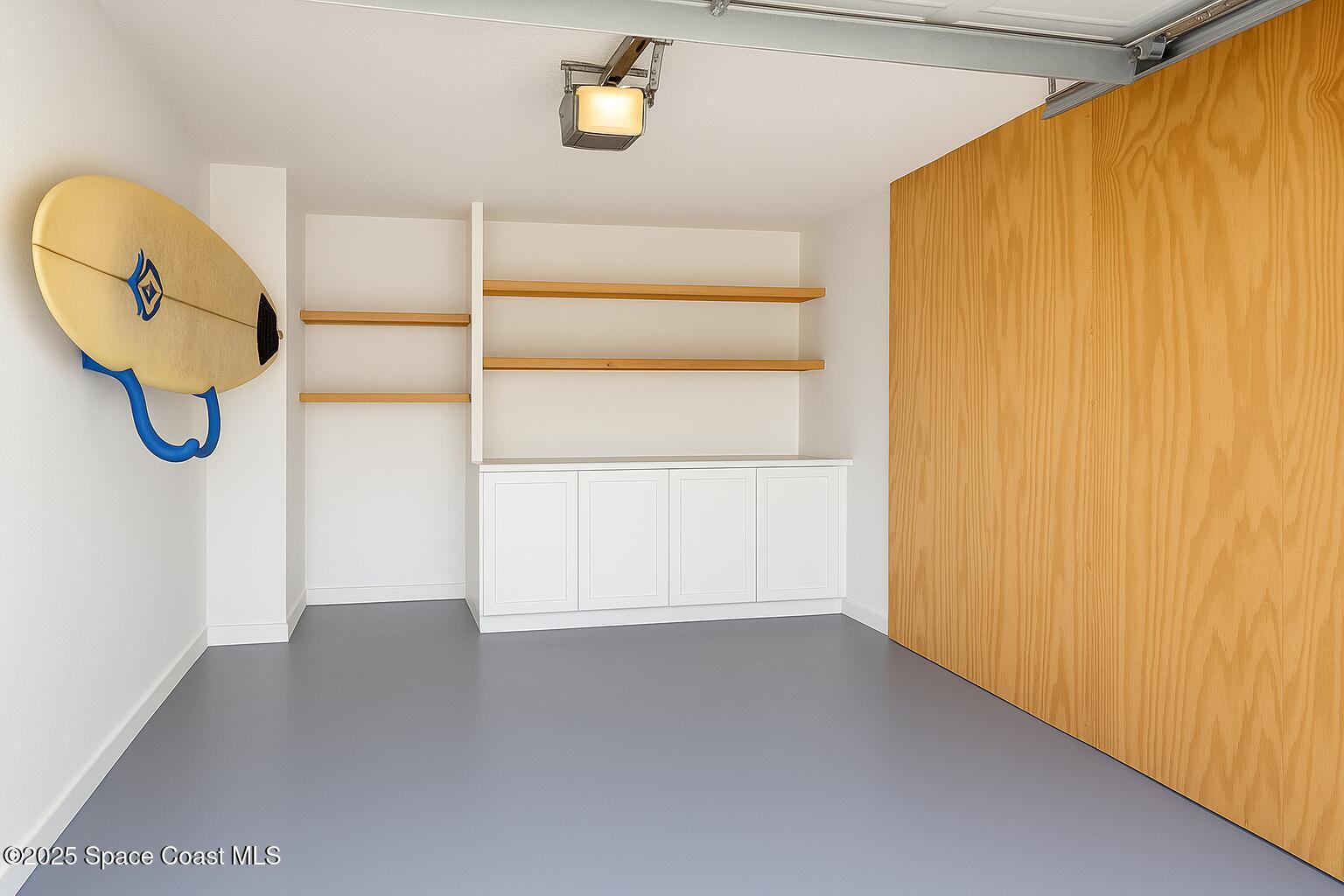 5 Fairway Drive, Unit 5 Cocoa Beach, FL 32931 - Photo 6 of 30 Virtually Stage 1 car garage