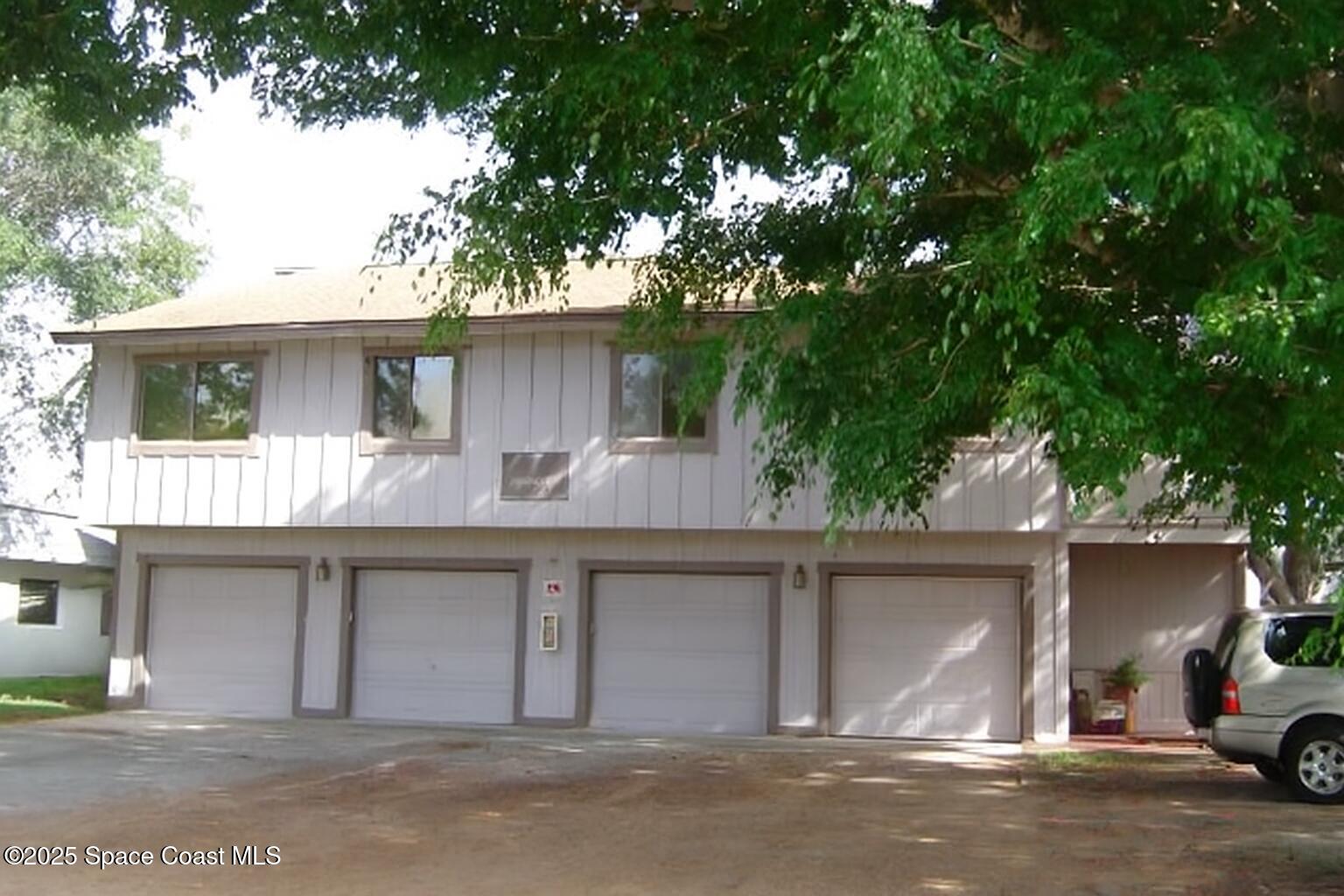 5 Fairway Drive, Unit 5 Cocoa Beach, FL 32931 - Photo 7 of 30 Private Garage Number 5