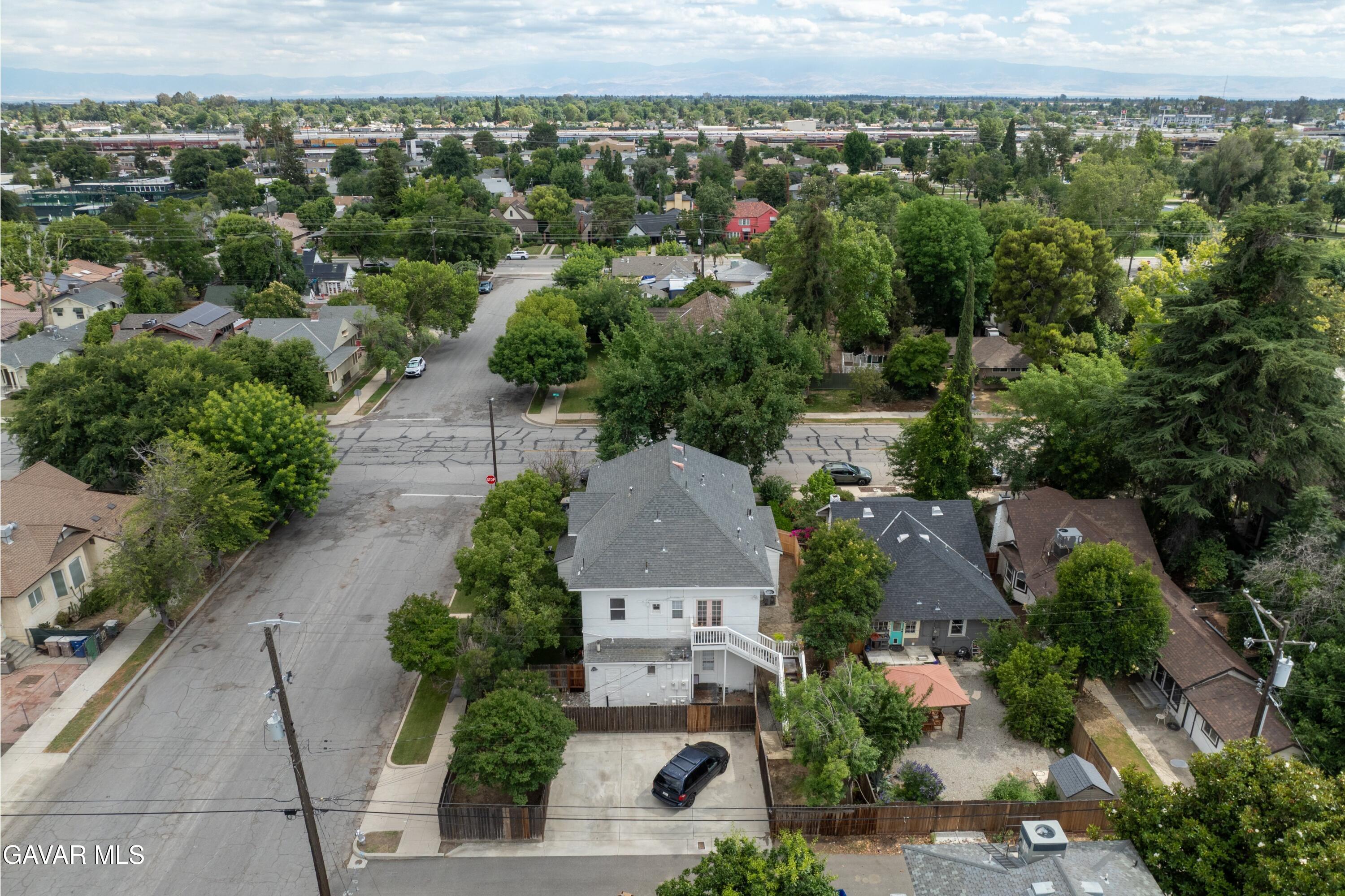 2702 19th Street Bakersfield, CA 93301 - Photo 16 of 21 an aerial view of a house with a garden