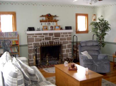 4152 Oakland Road Bethlehem, PA 18020 - Photo 2 of 4 Beautiful stone fireplace in large Living Room with refinished hardwood floors