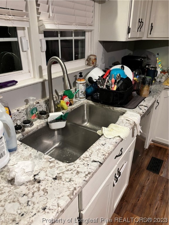 11828 Us Highway Maxton, NC 28364 - Photo 17 of 27 a kitchen with a stove a faucet and a sink
