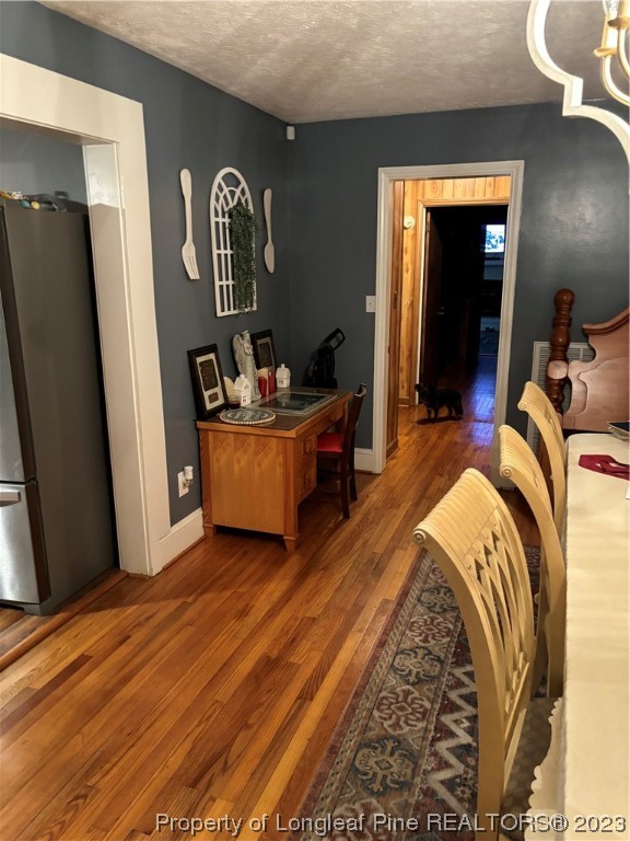 11828 Us Highway Maxton, NC 28364 - Photo 19 of 27 a bed room with a bed and a mirror