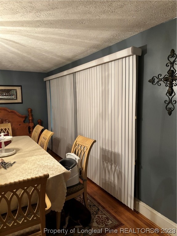 11828 Us Highway Maxton, NC 28364 - Photo 22 of 27 a bedroom with a bed and a table