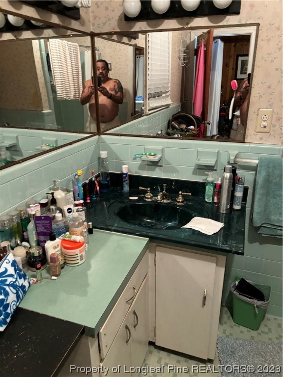 11828 Us Highway Maxton, NC 28364 - Photo 25 of 27 a kitchen with a stove and cabinets