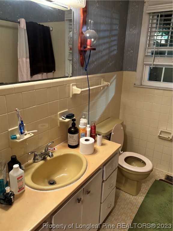 11828 Us Highway Maxton, NC 28364 - Photo 27 of 27 a bathroom with a sink and a toilet