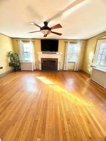 an empty room with an empty space and a fireplace