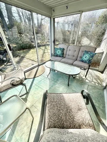 a view of a large pool with an ocean view