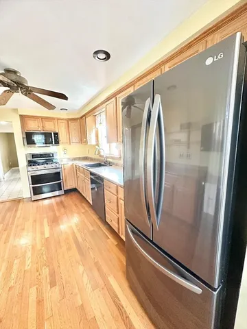a view of a television with wooden floor