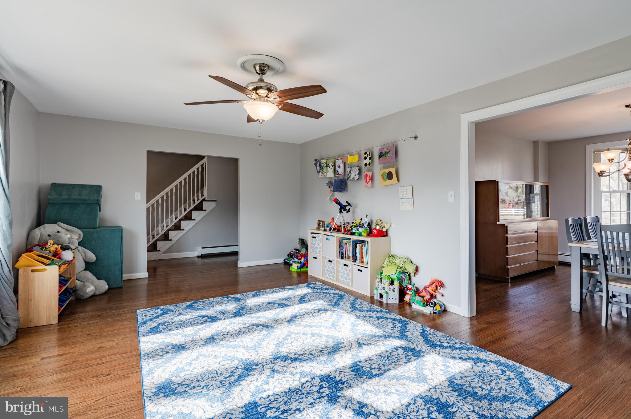 2288 Bramble Gate Drive Hatfield, PA 19440 - Photo 12 of 52 a view of a livingroom with wooden floor and a ceiling fan