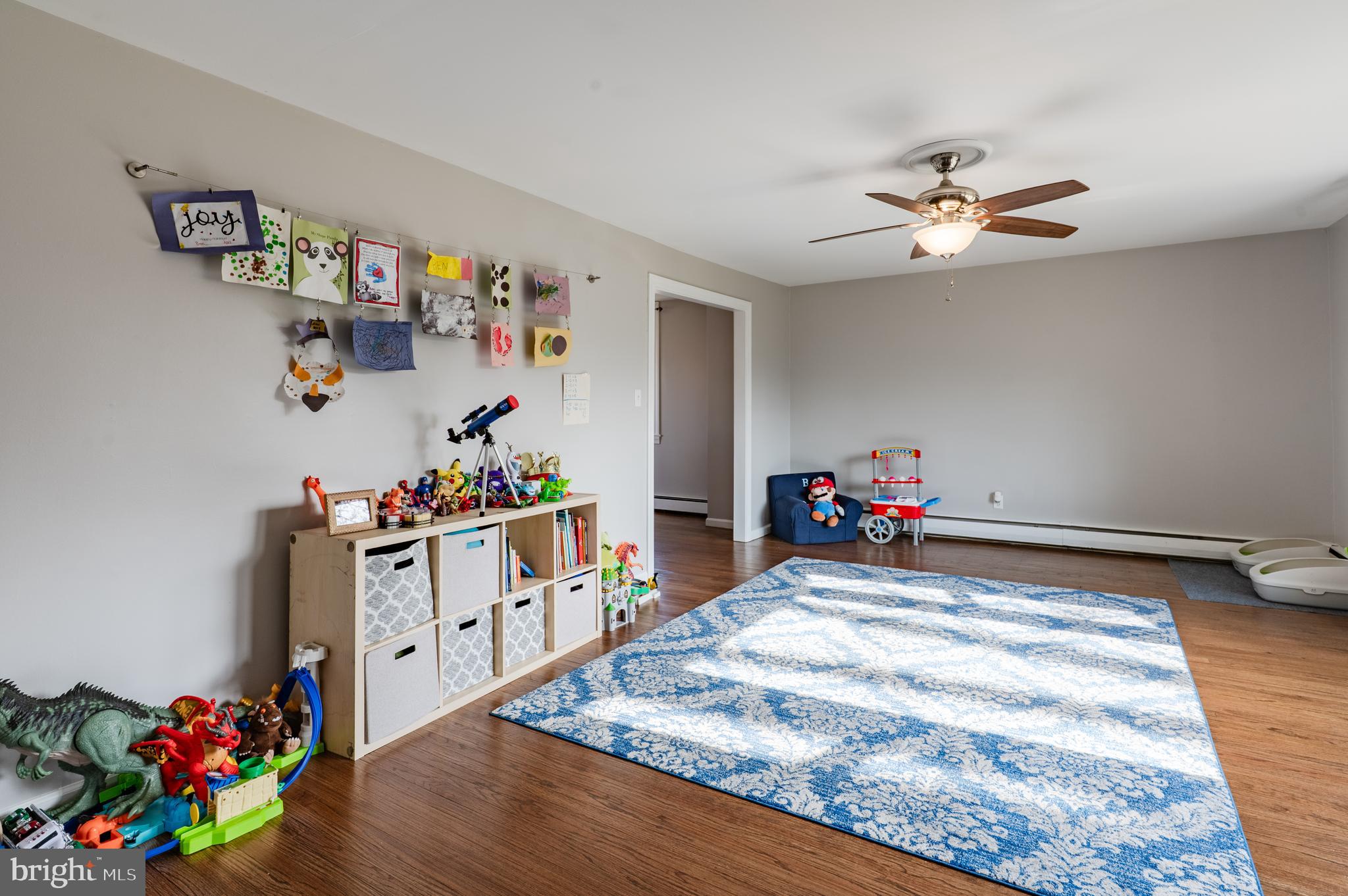 2288 Bramble Gate Drive Hatfield, PA 19440 - Photo 15 of 52 a bed room with a bed chandelier and a window