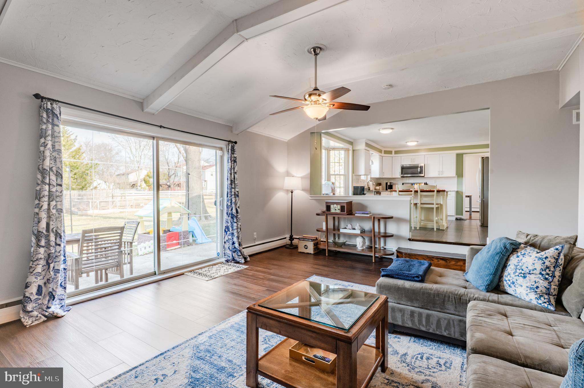 2288 Bramble Gate Drive Hatfield, PA 19440 - Photo 21 of 52 a living room with furniture ceiling fan and a large window
