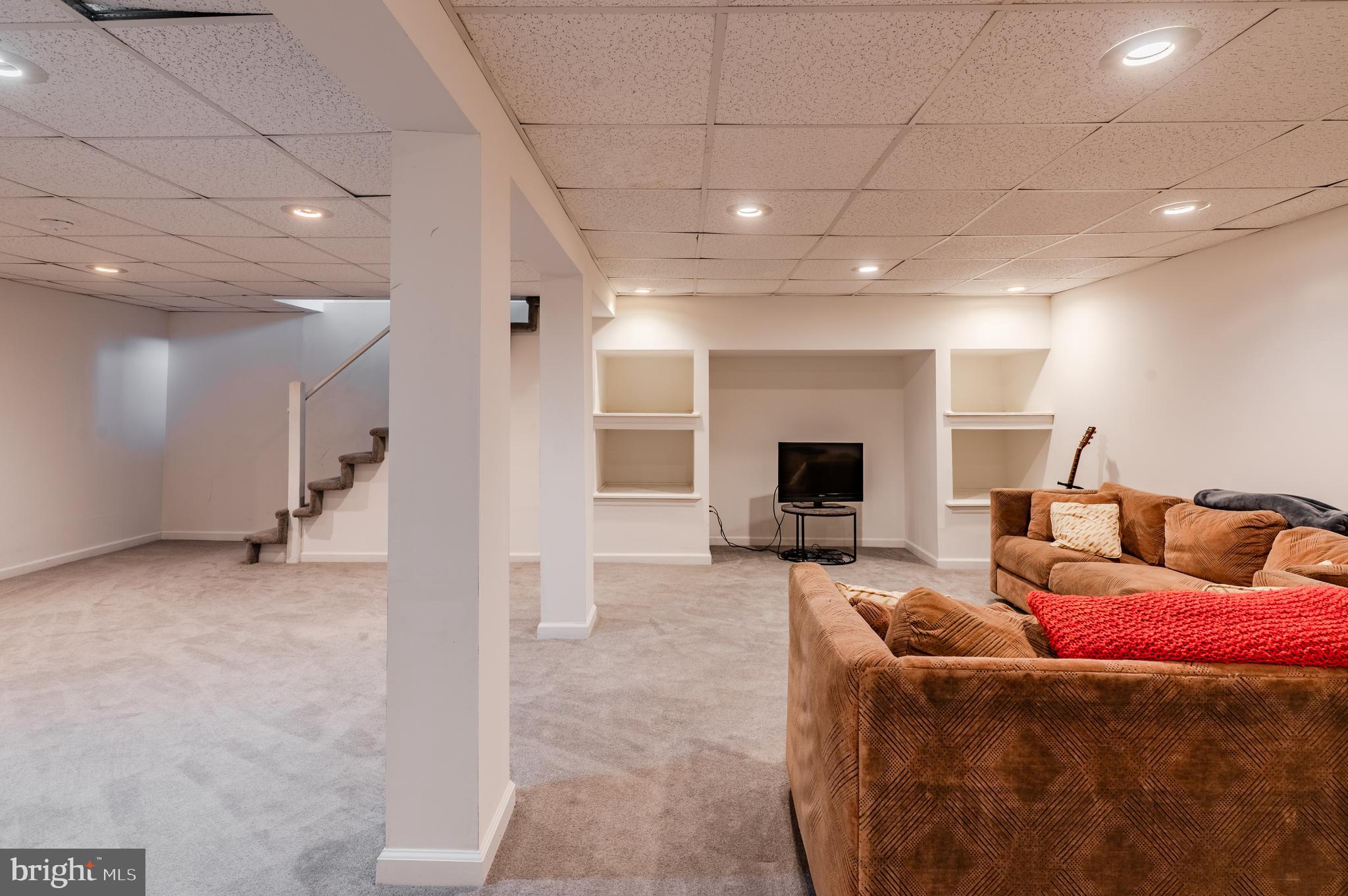2288 Bramble Gate Drive Hatfield, PA 19440 - Photo 22 of 52 a living room with furniture and a flat screen tv