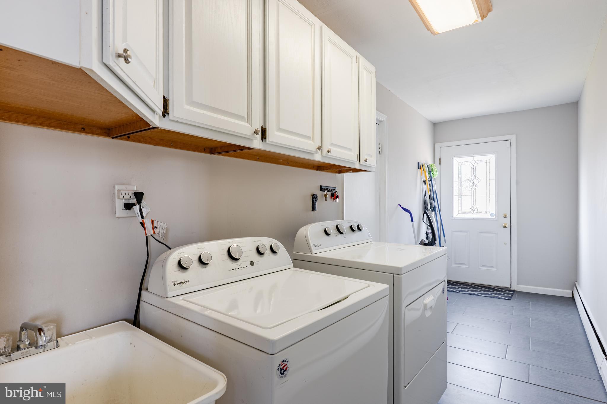2288 Bramble Gate Drive Hatfield, PA 19440 - Photo 27 of 52 a utility room with dryer and washer