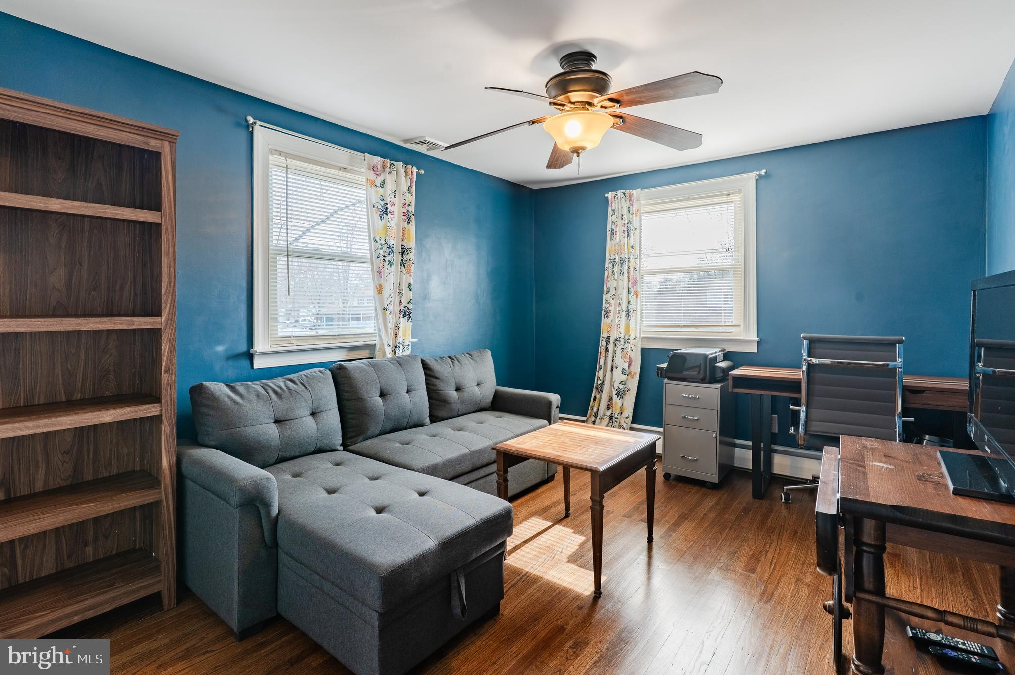 2288 Bramble Gate Drive Hatfield, PA 19440 - Photo 37 of 52 a living room with furniture a wooden floor and a window
