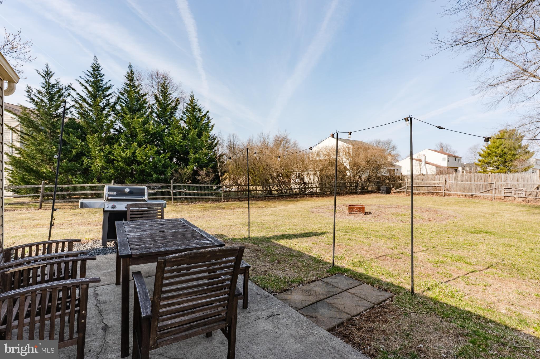 2288 Bramble Gate Drive Hatfield, PA 19440 - Photo 51 of 52 a view of a swimming pool with a chair and floor to ceiling window