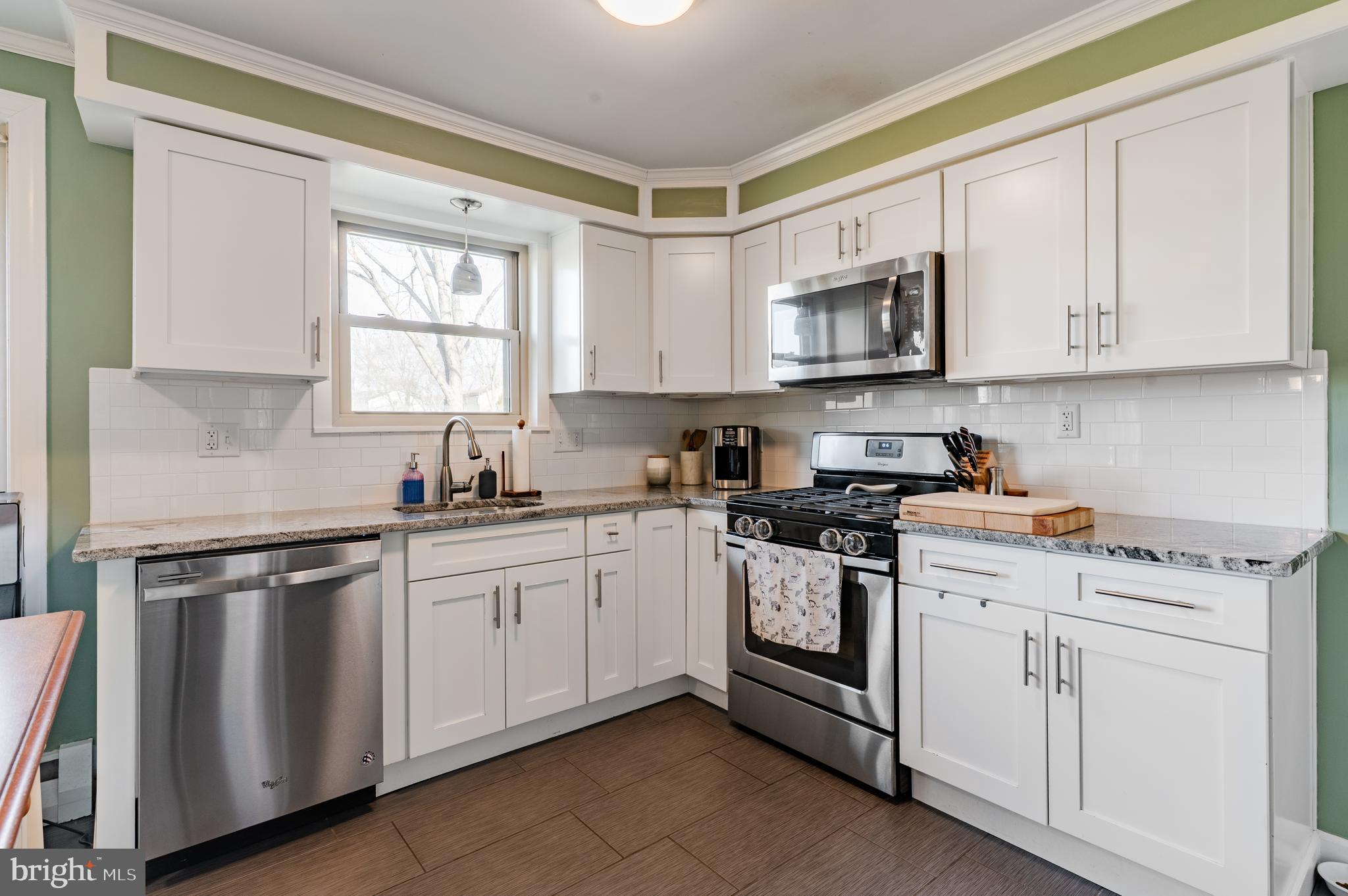 2288 Bramble Gate Drive Hatfield, PA 19440 - Photo 7 of 52 a kitchen with white cabinets stainless steel appliances and sink