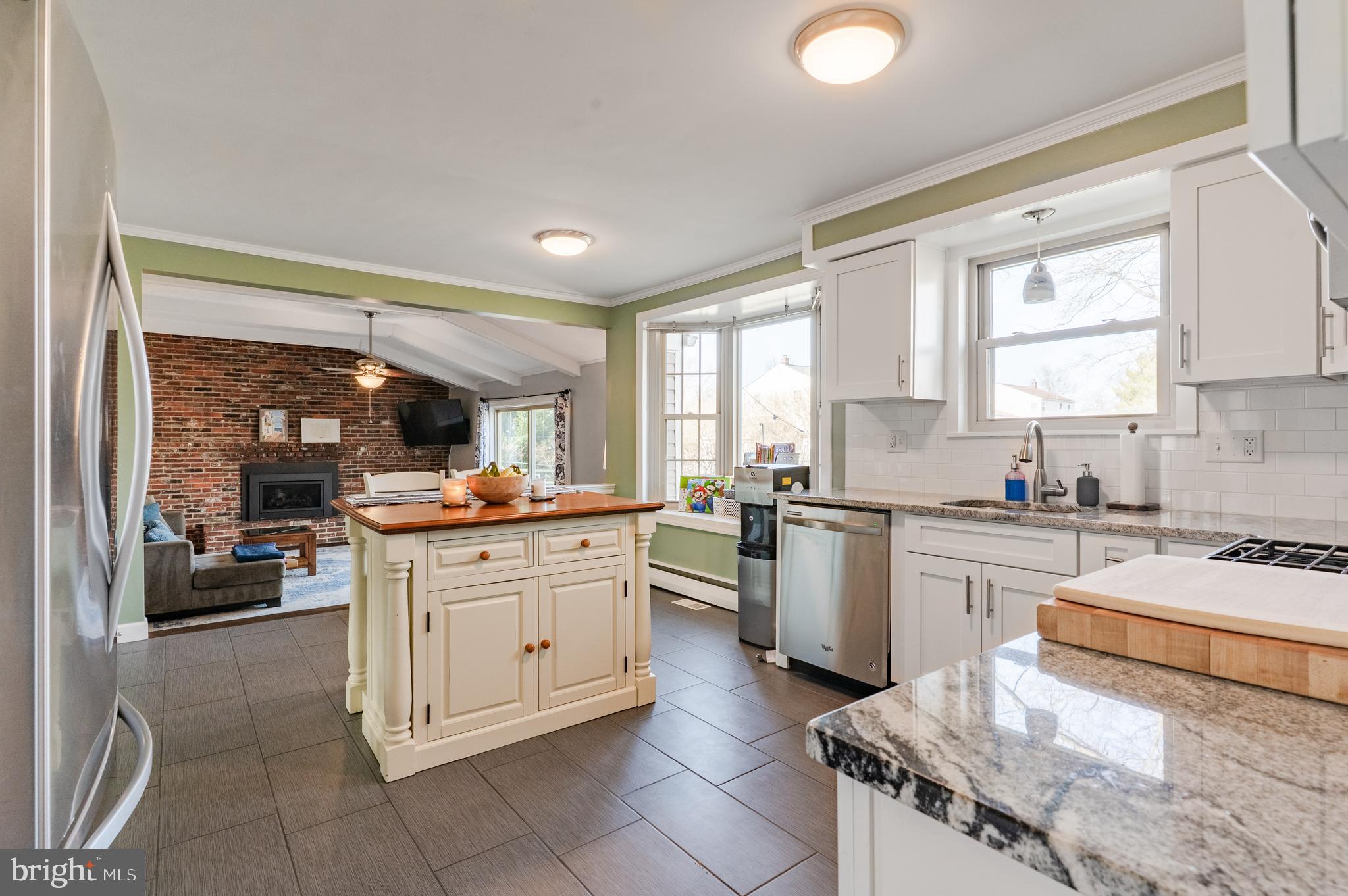 2288 Bramble Gate Drive Hatfield, PA 19440 - Photo 10 of 52 a kitchen with granite countertop cabinets stainless steel appliances a sink and a large window