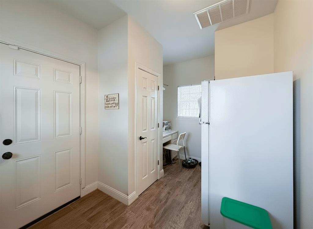 5871 Milam Road Denton, TX 76207 - Photo 23 of 40 Utility has built in desk, storage and room refrigerator