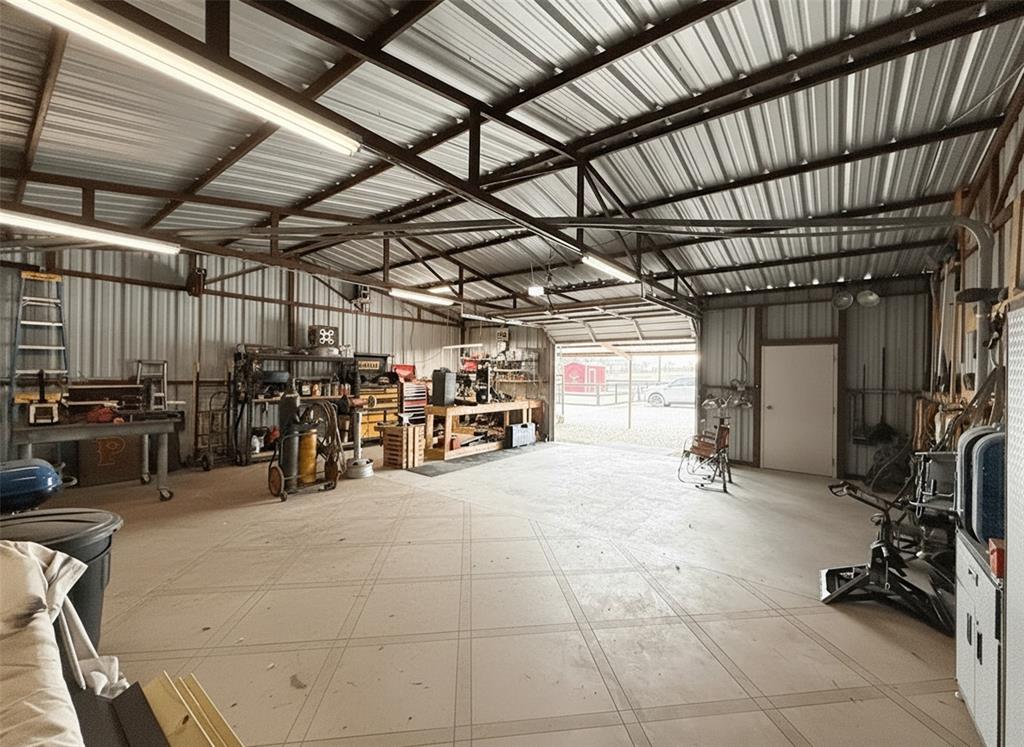 5871 Milam Road Denton, TX 76207 - Photo 32 of 40 30 x 30 Workshop with electricity and attached carport