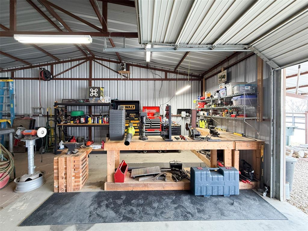 5871 Milam Road Denton, TX 76207 - Photo 33 of 40 30 x 30 Workshop with electricity and attached carport