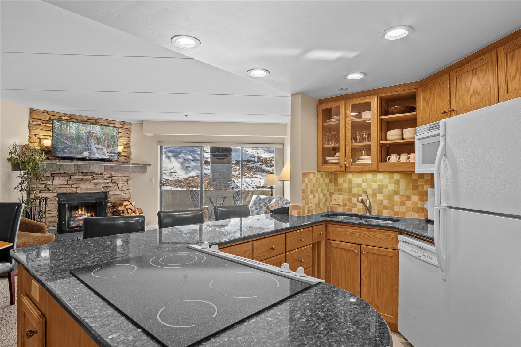 640 Village Road, Unit 4110 Breckenridge, CO 80424 - Photo 11 of 50 a kitchen with stainless steel appliances granite countertop a sink refrigerator and stove