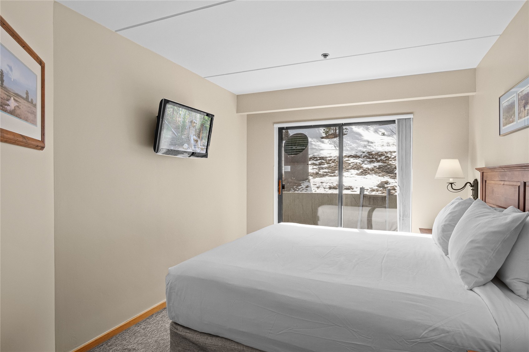 640 Village Road, Unit 4110 Breckenridge, CO 80424 - Photo 18 of 50 a bedroom with a large bed and a window