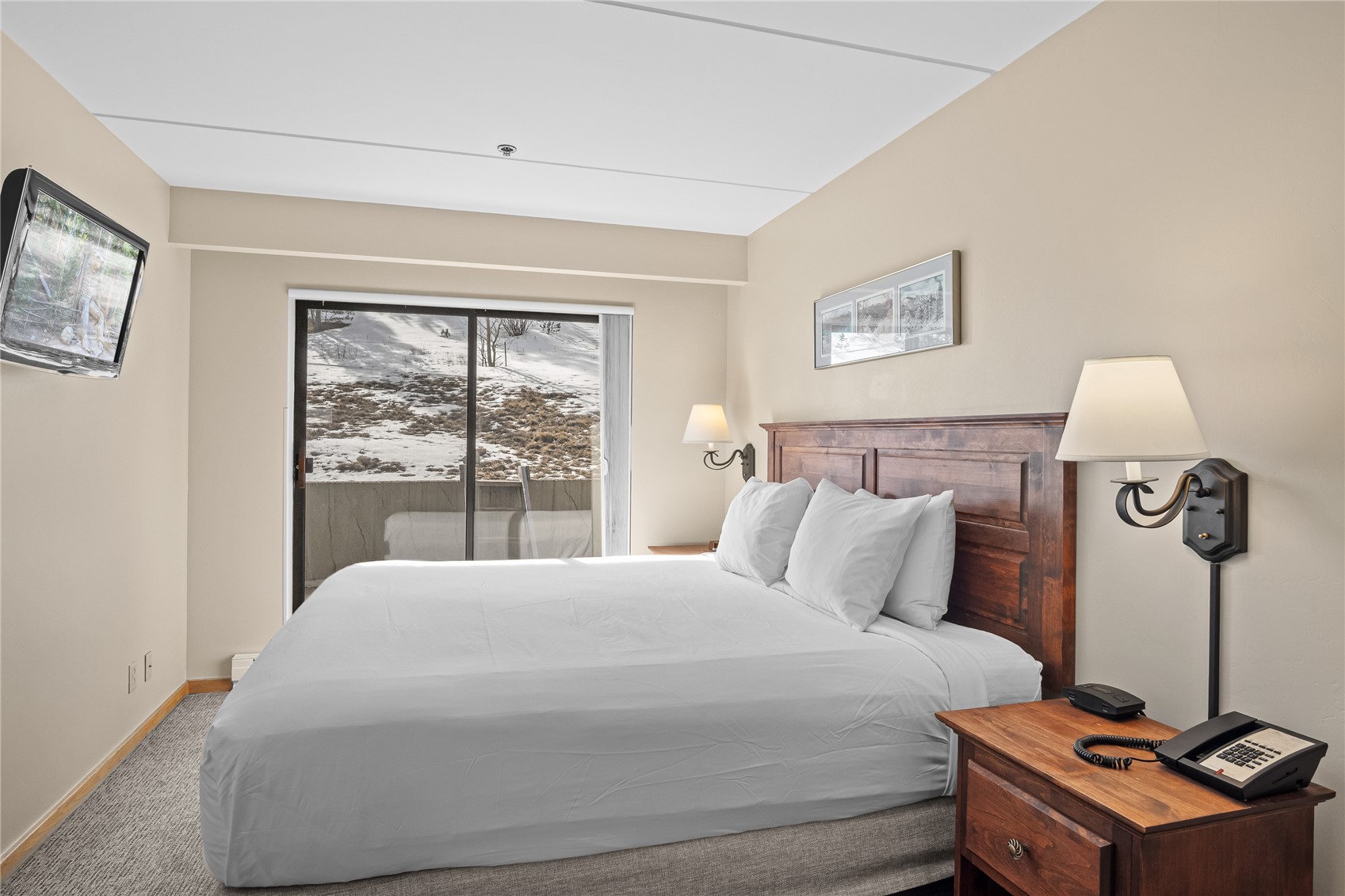 640 Village Road, Unit 4110 Breckenridge, CO 80424 - Photo 20 of 50 a bedroom with a bed and next to a window