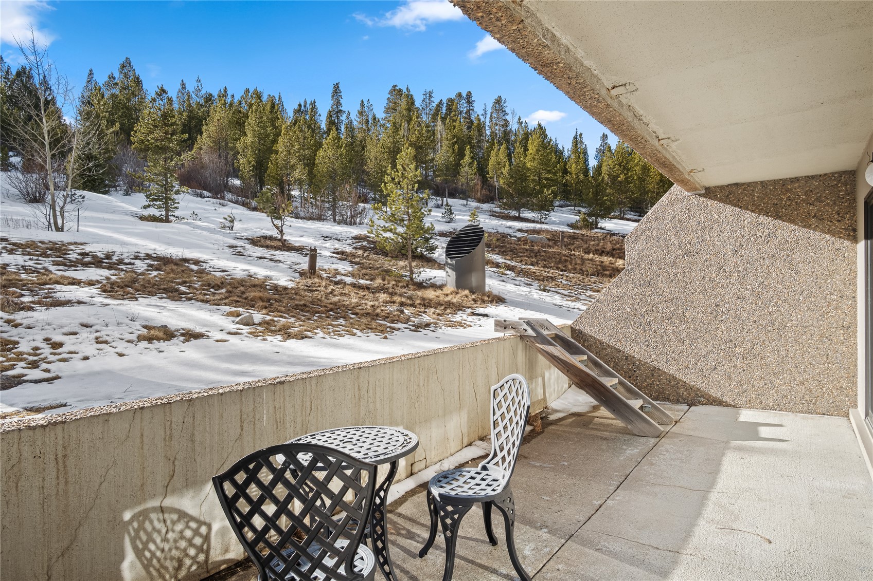 640 Village Road, Unit 4110 Breckenridge, CO 80424 - Photo 26 of 50 a view of a terrace with trees and sitting space